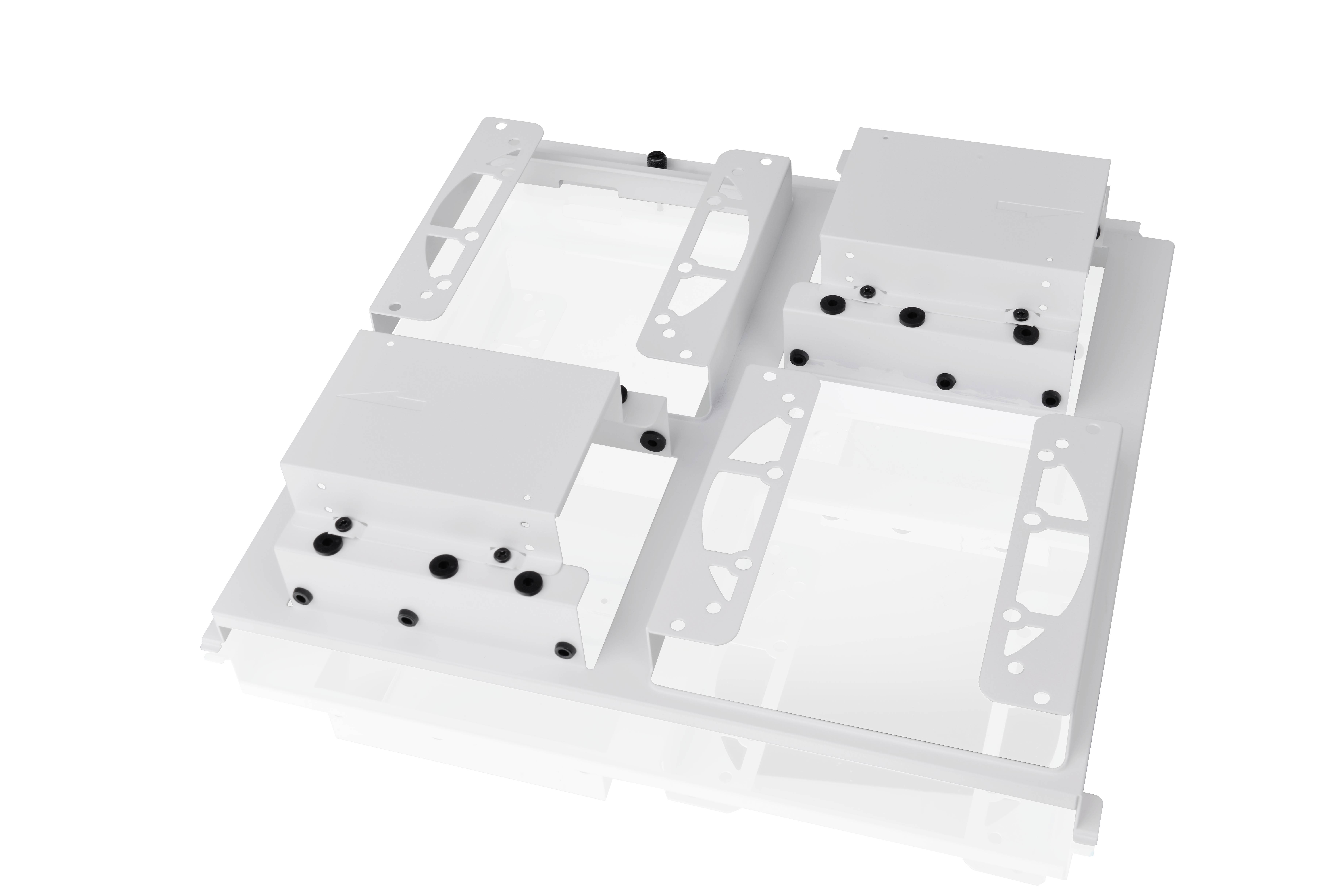 'Four white frames with black dots, symmetrically arranged. They are mounted on a white surface and slightly reflected.'