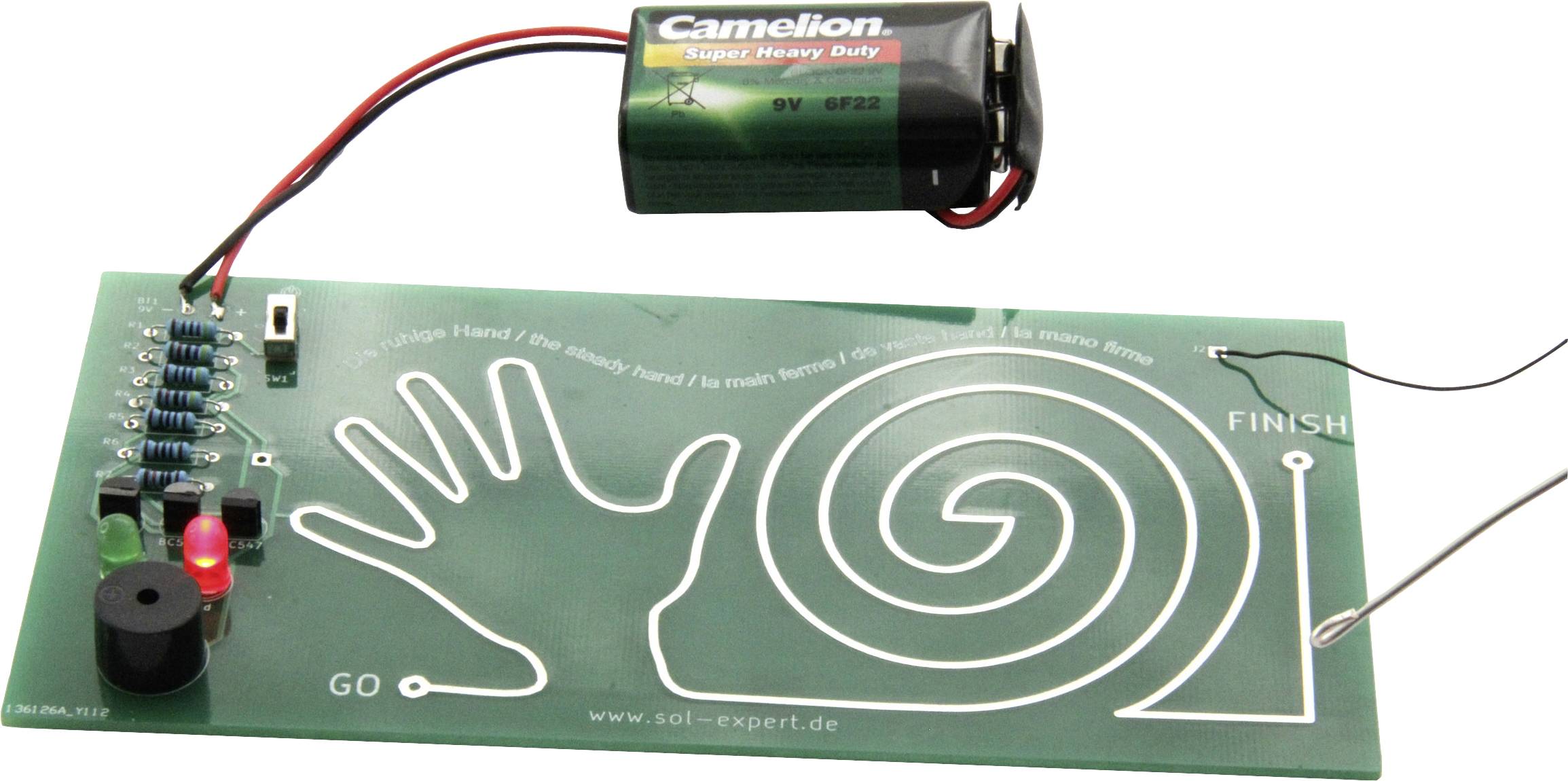 'Doolhofspel-schakeling met handcontoer, LED's en batterij. Speler leidt draad langs spiraalvormig traject naar de finishlijn.'