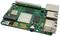 Een groene printplaat met verschillende chips en aansluitingen, waaronder USB- en HDMI-poorten. Het betreft een single-boardcomputer.