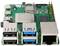 Een groene printplaat met meerdere USB-poorten, een Ethernet-aansluiting en verschillende elektronische componenten.