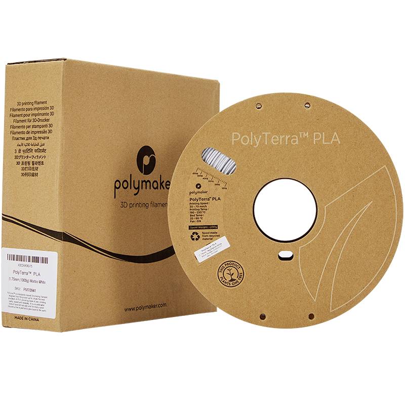 Filamentspoel en karton voor 3D-printen van 'PolyTerra PLA', bruin, duurzaam materiaal, milieuvriendelijke verpakking.