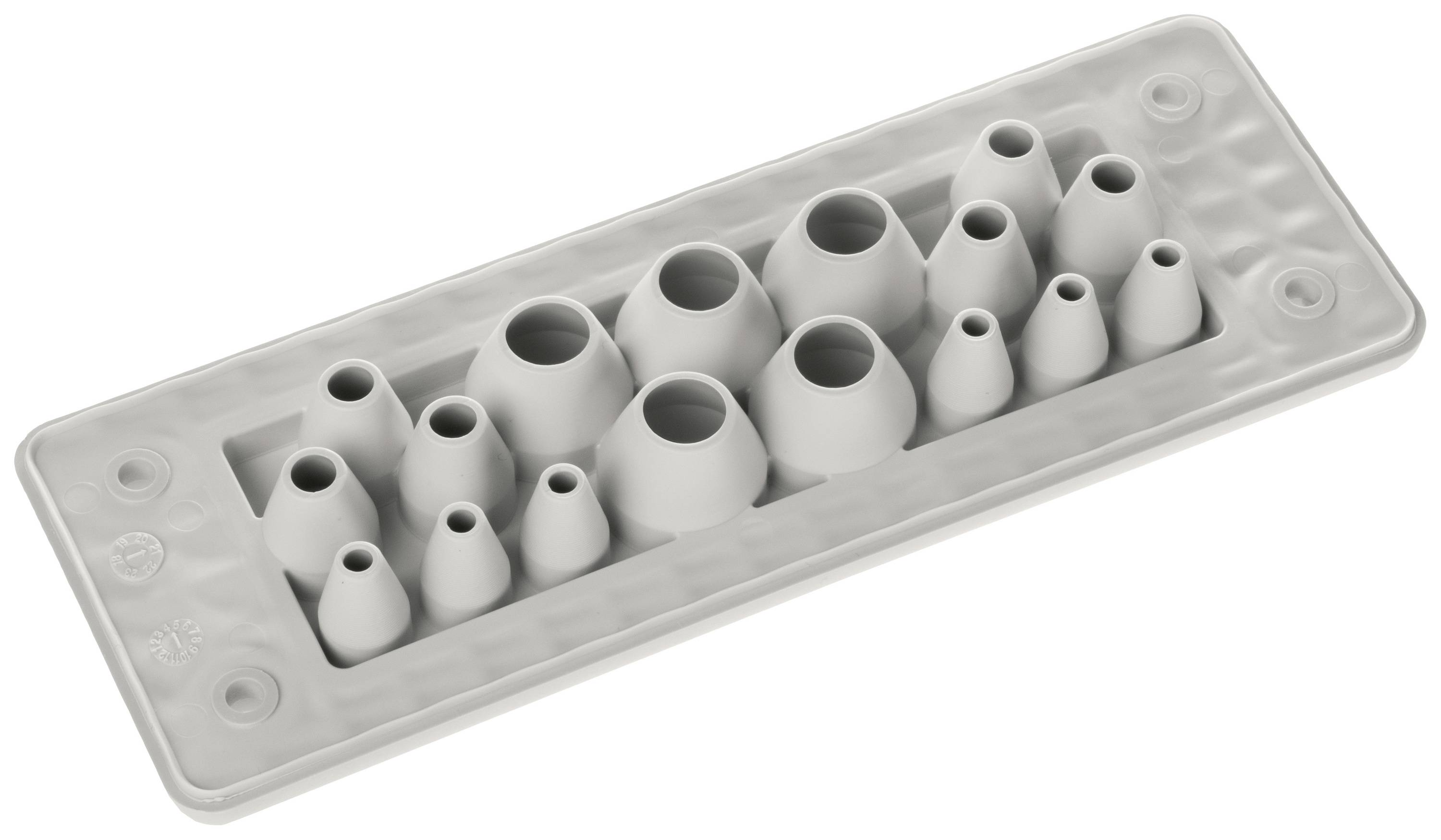 Een grijze siliconenvorm met verschillende kegelvormige holtes voor gebruik als spuitzakopzetstukken.