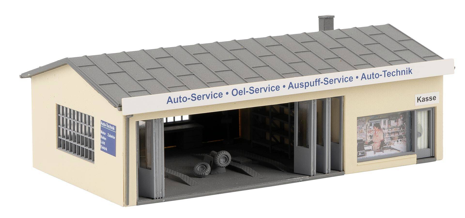 Een model van een autogaragebedrijf met de opschriften 'Auto-Service', 'Olie-Service', 'Uitlaat-Service', 'Auto-Techniek' en 'Kassa'.