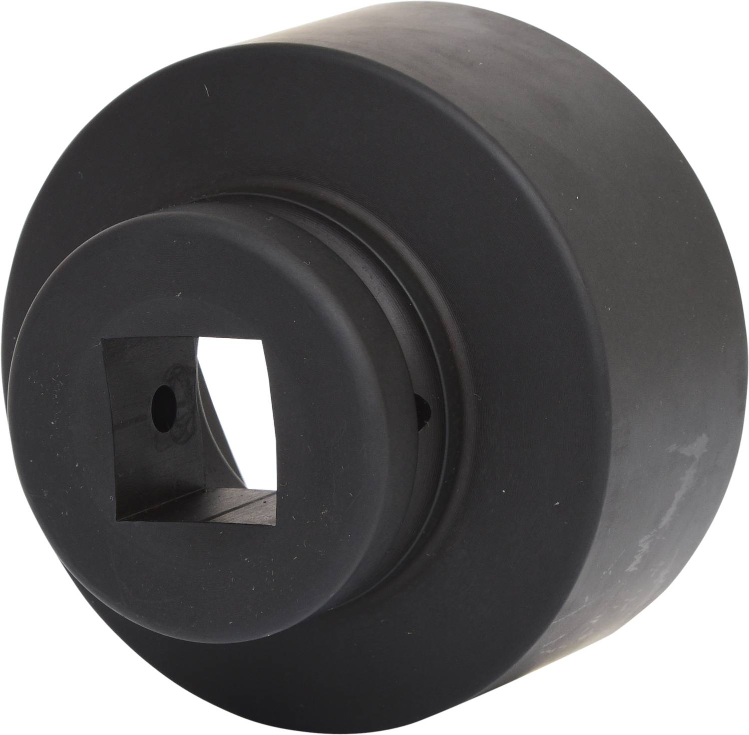 Zwart, cilindrisch gereedschap met een vierkante opening in het midden, waarschijnlijk bedoeld voor technische of mechanische toepassingen.