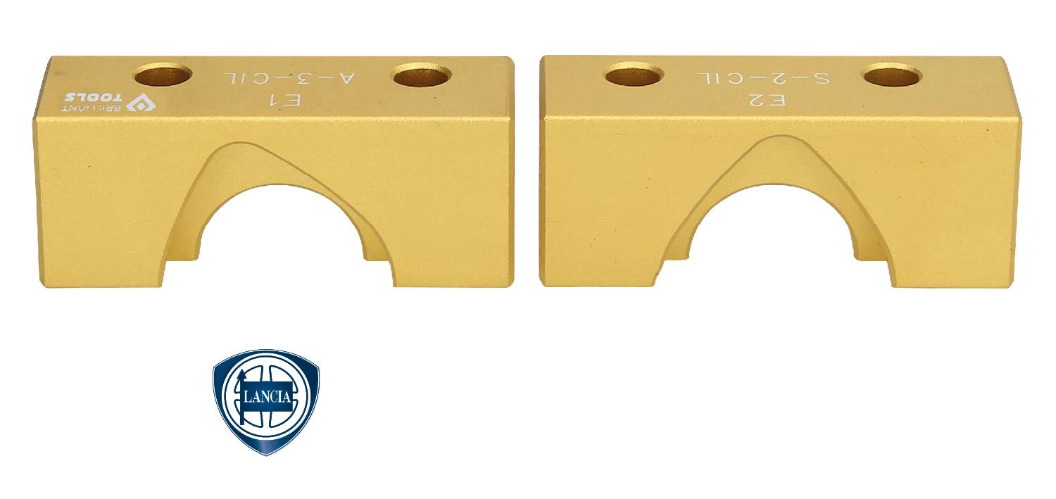 Twee gouden metalen blokken met genummerde markeringen 'E1' en 'E2', symmetrisch naast elkaar geplaatst. Daaronder een rond blauw logo.