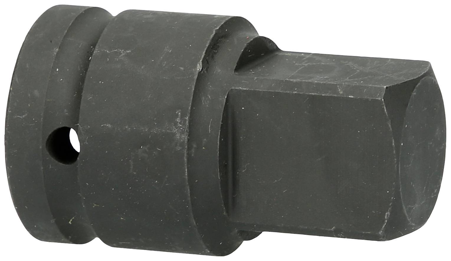 Een zwarte, rechthoekige metalen adapter met een rond uiteinde en een gat, mogelijk een gereedschapsopzetstuk.