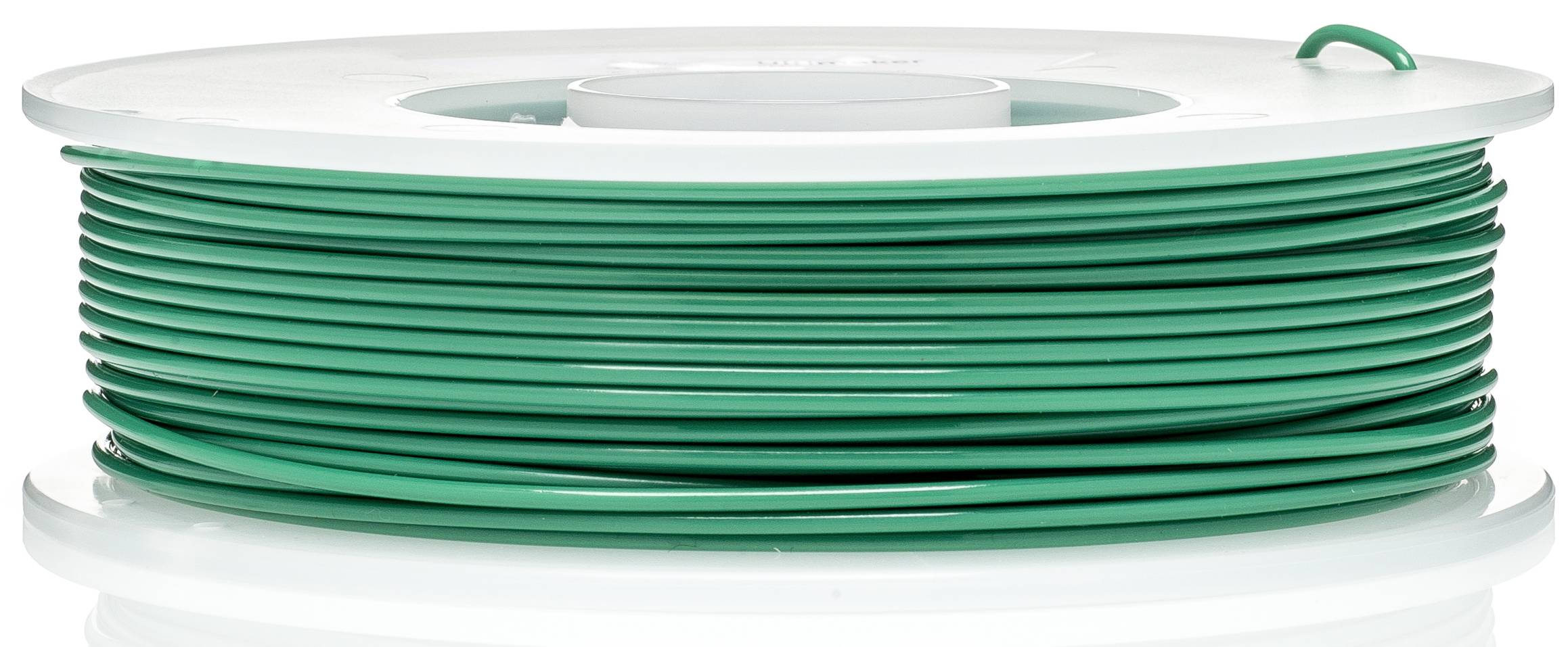 Een groene filamentspoel voor 3D-printers, genomen van opzij.