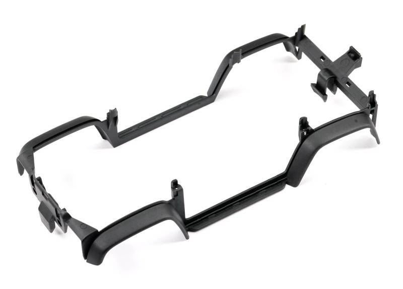 Een zwart, rechthoekig kunststof frame met meerdere clips en bevestigingen, kennelijk een onderdeel voor de montage van een technisch apparaat.