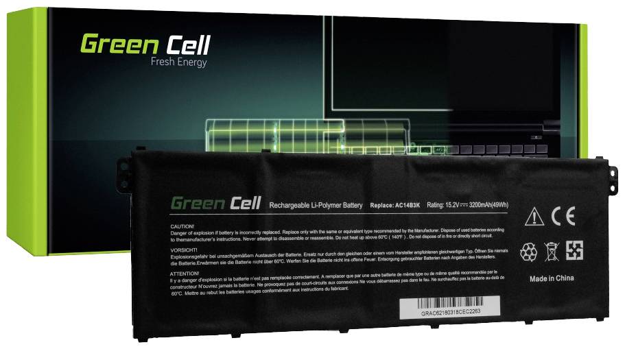 Zwarte laptopbatterij van het merk 'Green Cell' op de voorgrond, verpakking met groen en zwart design op de achtergrond.