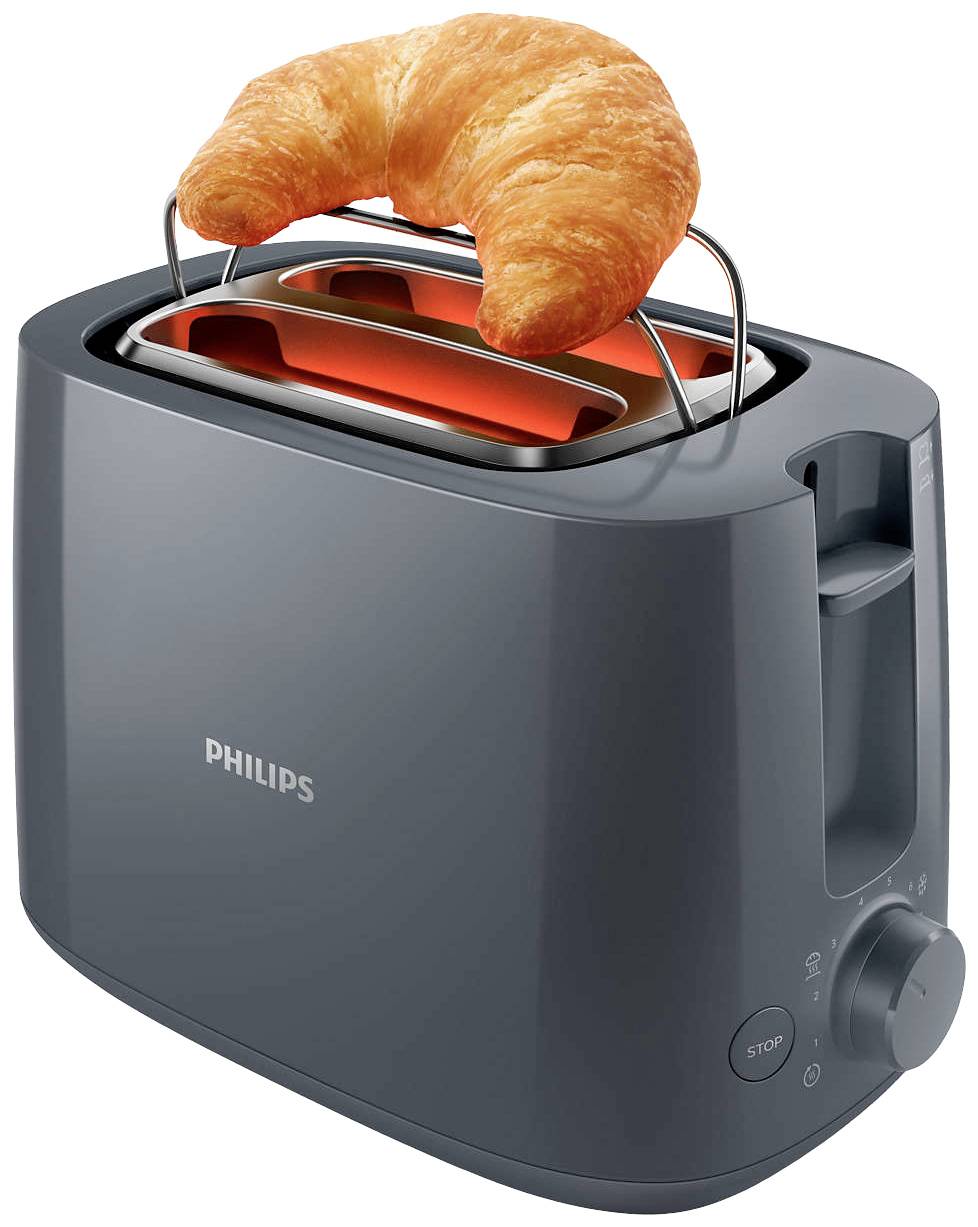 Een grijze Philips broodrooster waarop een croissant wordt verwarmd op een speciale broodverwarmer.