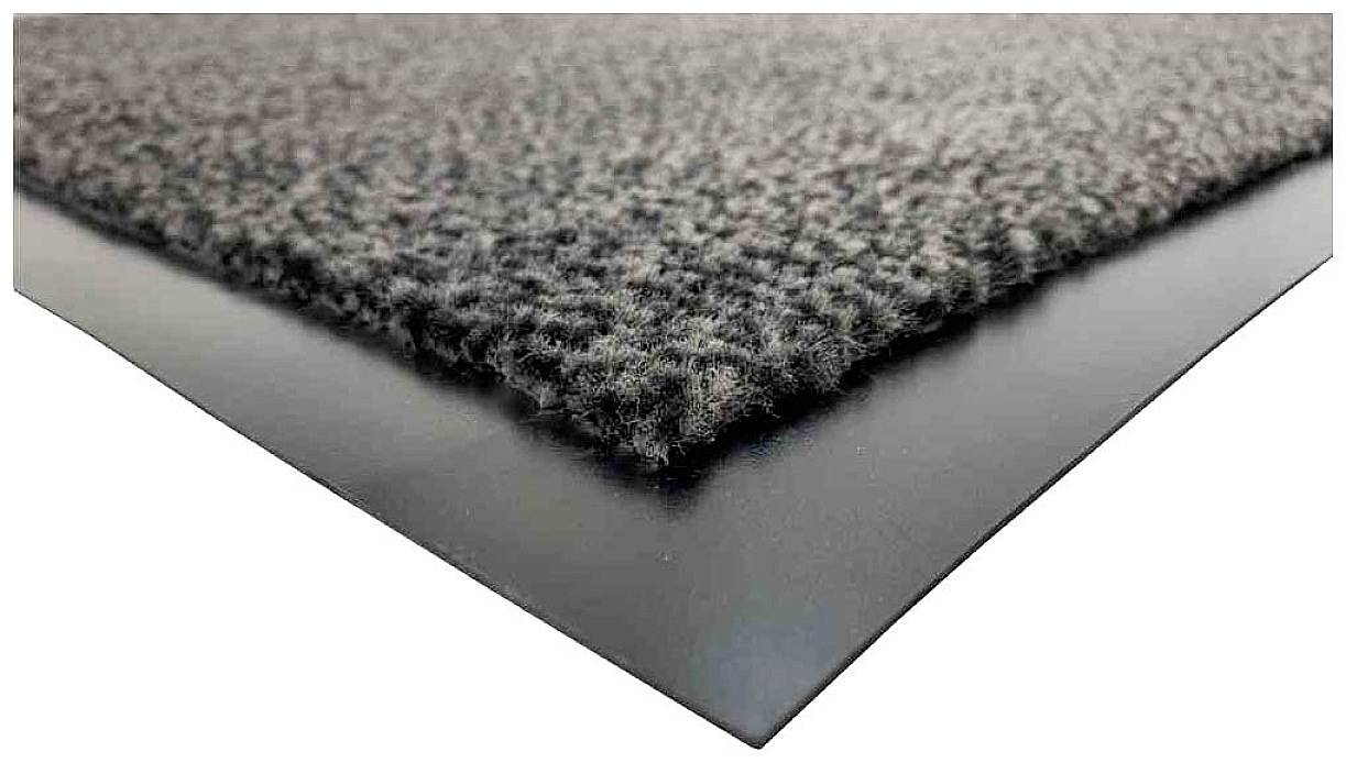 Zijaanzicht van een antislip vloermat met een zwarte rubberen rand en een grijze, gestructureerde oppervlakte.