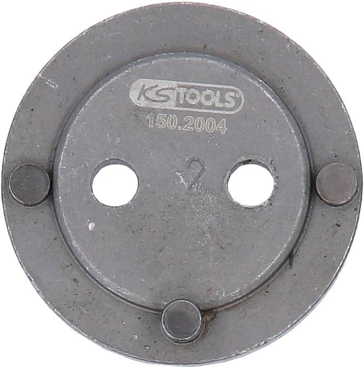 Metalen werkstuk met merklogo en twee ronde gaten. Vier bolle plekken aan de randen. Gereedschap voor mechanica.
