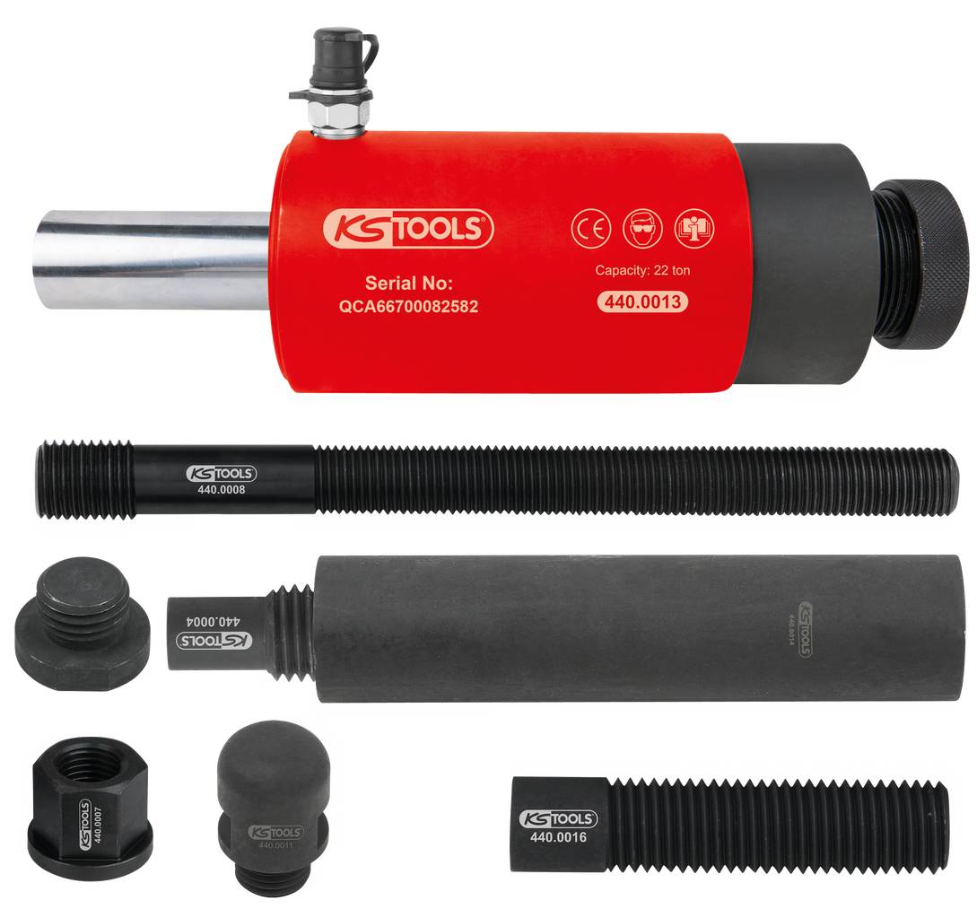 'KS Tools' hydraulische cilinder in rood met een capaciteit van 22 ton, omringd door verschillende zwarte toebehoren zoals bouten en moeren.