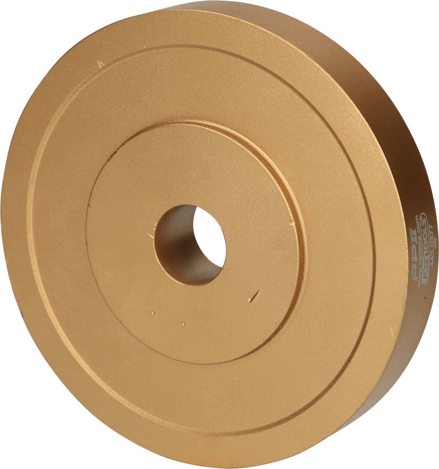 Een gouden metalen schijf met een cilindrische vorm en een gat in het midden. Het zou deel kunnen uitmaken van een mechanisme of machine.