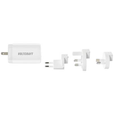 Een wit USB-oplader van Voltcraft met vier verschillende verwisselbare stekkeradapters voor internationaal gebruik.