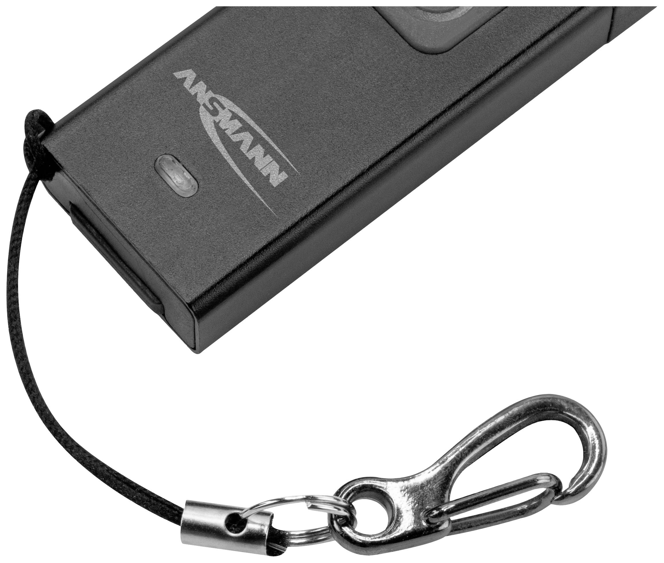 Een rechthoekige zwarte afstandsbediening-sleutelhangers met lus en metalen clip, merknaam 'Ansmann' herkenbaar.