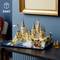 LEGO-model van een kasteel met veel torens, op een tafel. Links bovenaan staat het getal '2660' naast een LEGO-symbool.