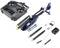 Afstandsbediende helikopter-kit met besturing, oplader, reserverotorbladen en gereedschap.