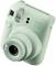 Directe-ontwikkelcamera in muntgroen. Logo 'instax mini 12', lens met scherptediepte-aanduiding.