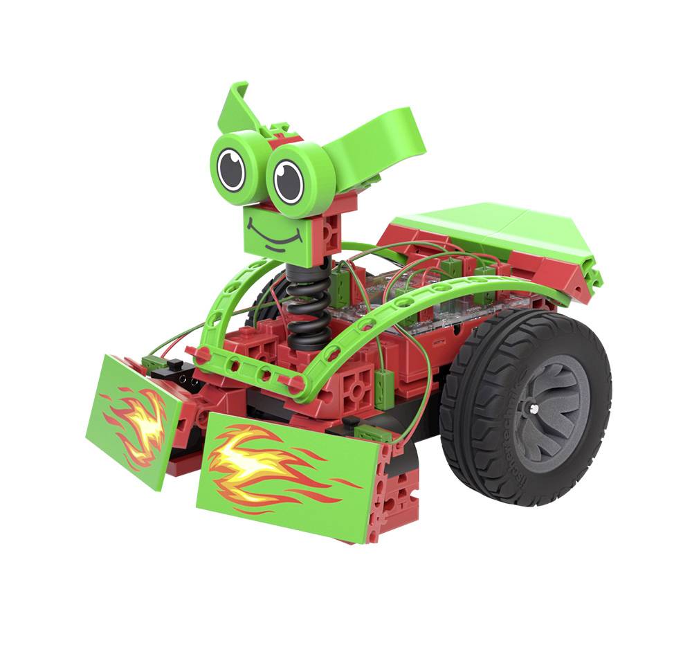 Een kleurrijke, speelgoedachtige robot van plastic, voornamelijk in het groen en rood, met grote, lachende ogen en decoratieve vlammen.
