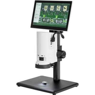 Een digitale microscoop toont vergrote beelden van een groene printplaat op een monitor.