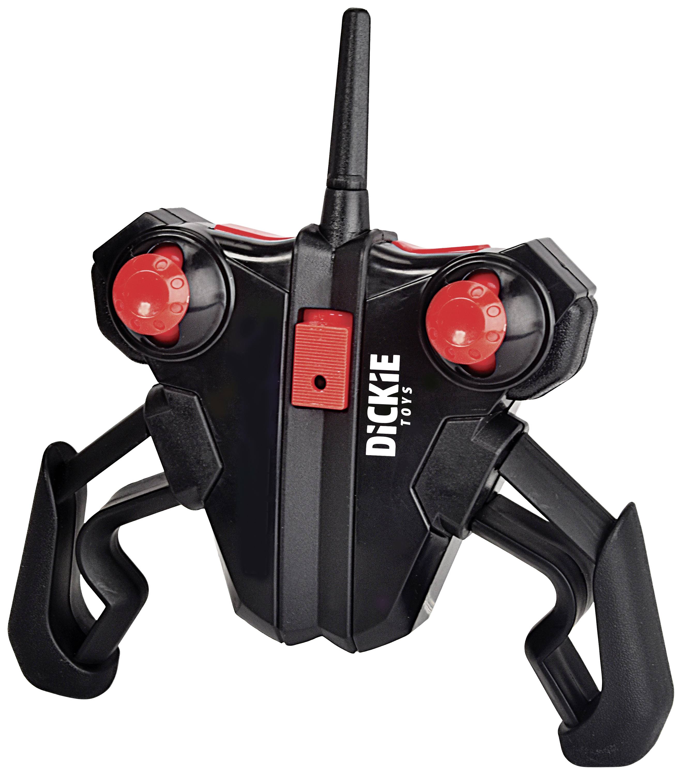 Een zwarte speelgoed-afstandsbedieningscontroller met rode knoppen en hendels, merk 'DICKIE TOYS', voor het besturen van modelvoertuigen.