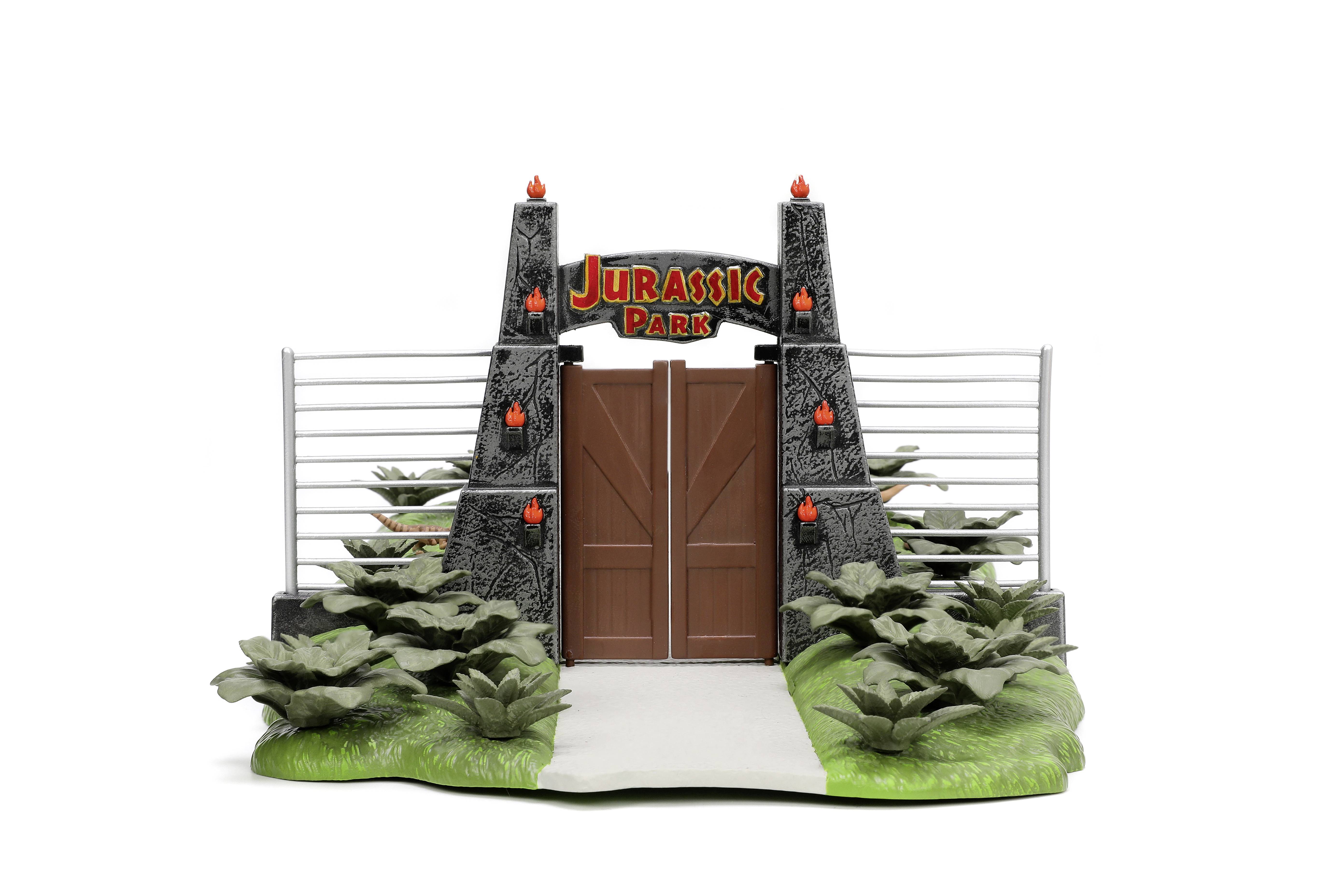 Ingangspoort met bord 'Jurassic Park', geflankeerd door planten en rotsformaties, symboliseert avontuur en dinosauriërs.