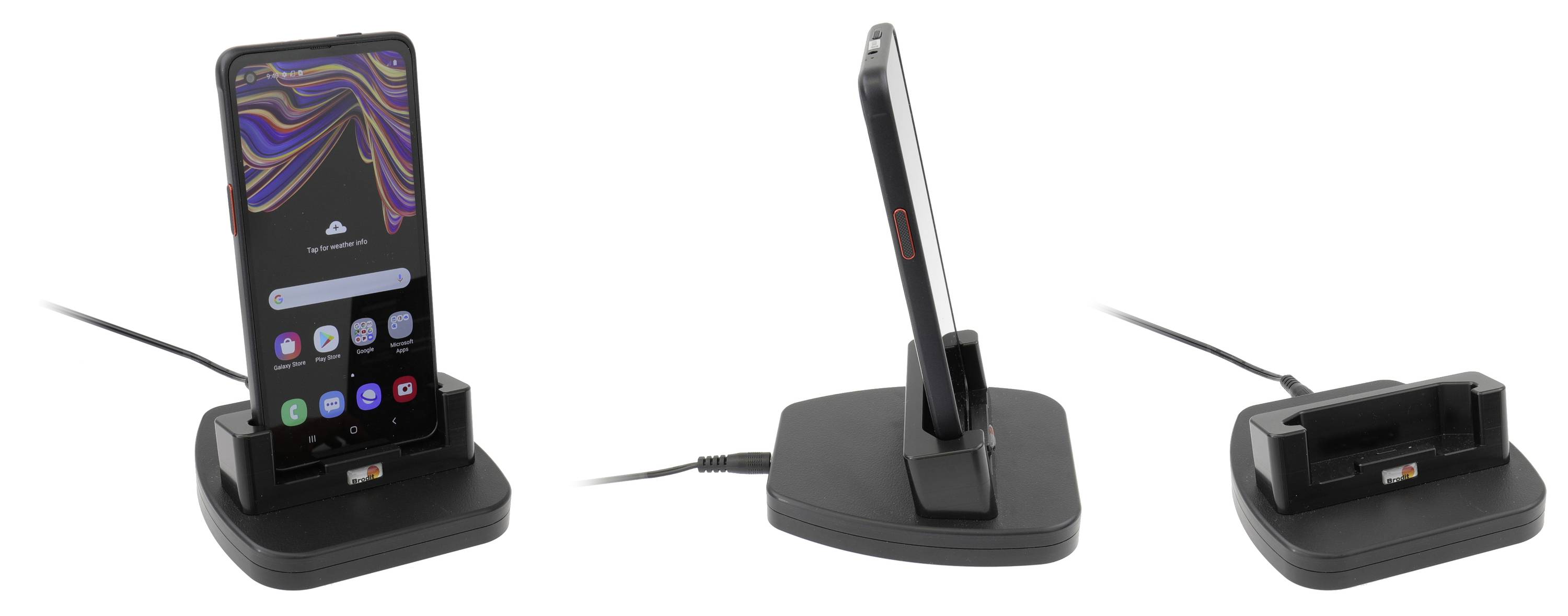 Smartphone in een dockingstation, zijaanzicht en vooraanzicht. Apparaat toont startscherm, USB-kabel aangesloten voor stroomvoorziening.