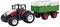 Een speelgoedtractor met een rode carrosserie trekt een groene aanhanger met witte houten latten. Beide hebben grote, zwarte banden.