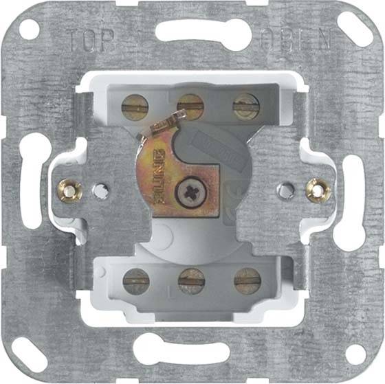 Een metalen montageframe voor een lichtschakelaar met schroefgaten en een middelste opening voor bevestiging. Bovenste rand gemarkeerd met 'TOP'.