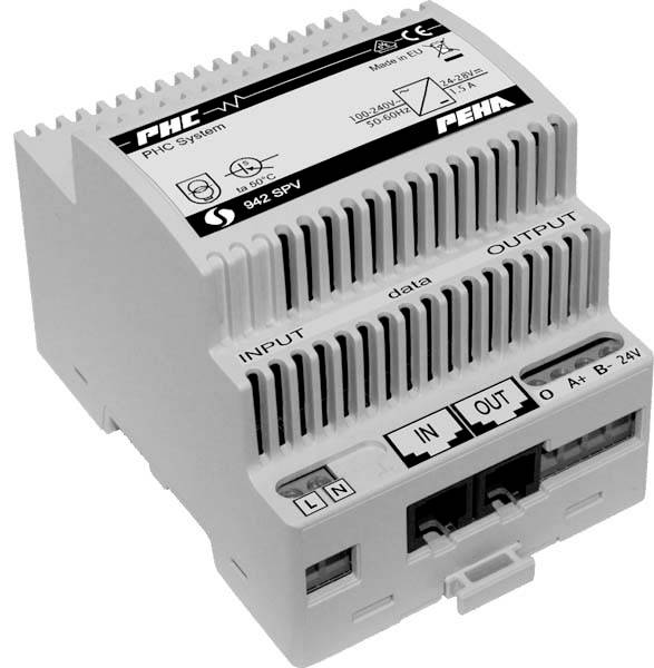 Een wit elektrisch stuureenheidapparaat met het opschrift 'PEHA PHC Systeem'. Het heeft ingangs- en uitgangaansluitingen voor 24V en gegevensuitwisseling.