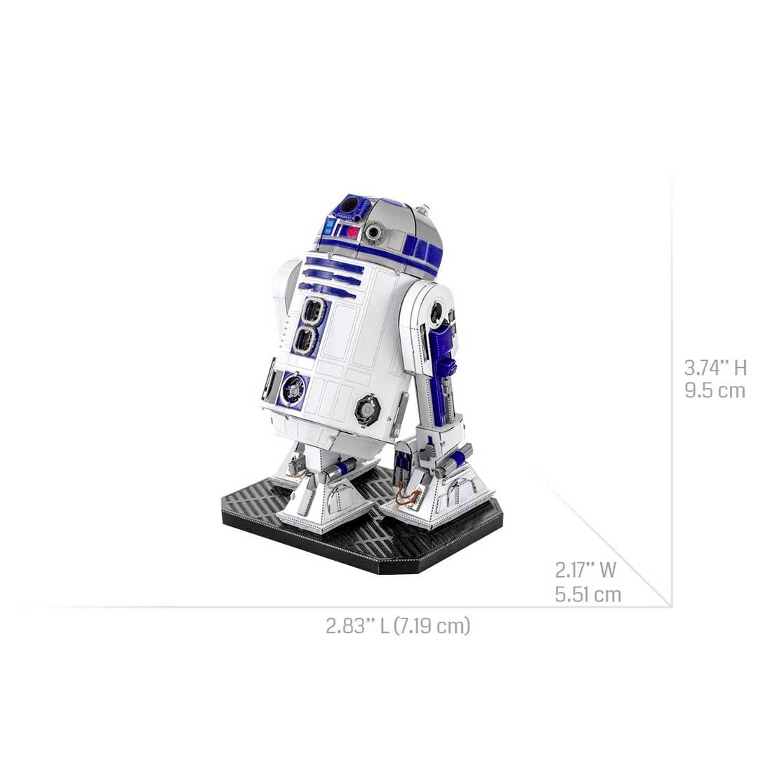 Een model van een witte en blauwe robot staat op een klein platform. Afmetingen: 7,9 cm lang, 5,5 cm breed, 9,5 cm hoog.