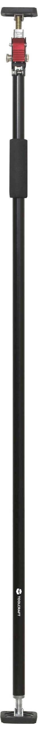 Een zwarte telescopische steunpaal met rode handgreep bovenaan en zwarte rubberen voet onderaan, vaak gebruikt voor bouw- of renovatieprojecten.