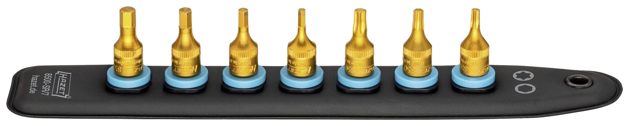 'Set van zeven gouden bits met blauwe houder op zwarte basis.'