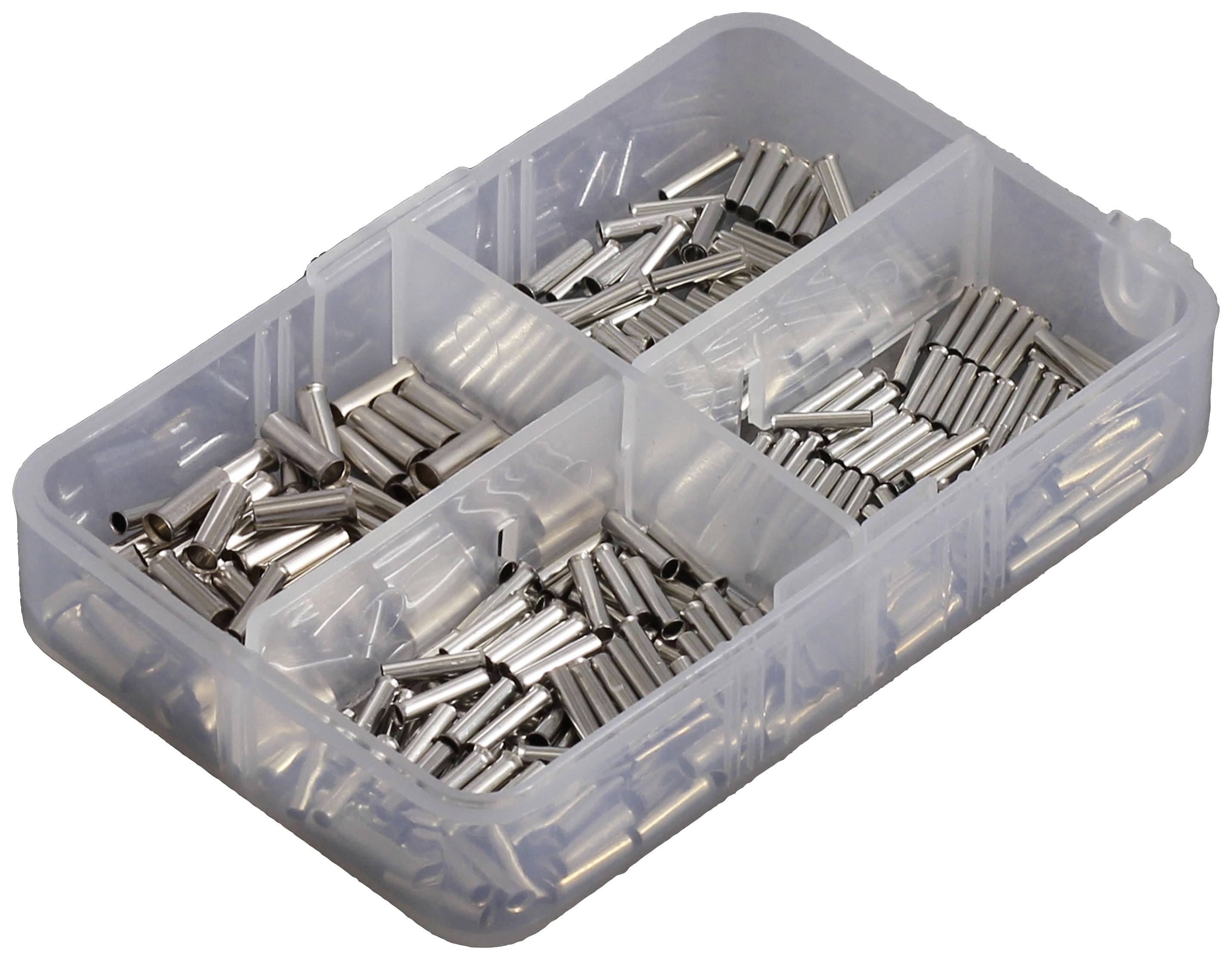 Kleine, zilveren metalen cilinders van verschillende formaten in een transparante kunststof container met vier compartimenten.