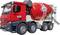 Speelgoed betonmixer met rood onderstel en draaiende trommel.
