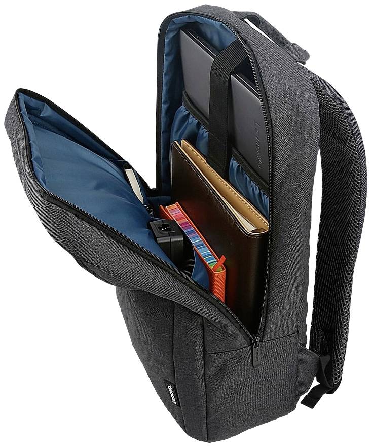 Een geopende, donkergrijze rugzak met meerdere vakken; bevat een laptop, een notitieboek, een camera en een kleurrijke tas.