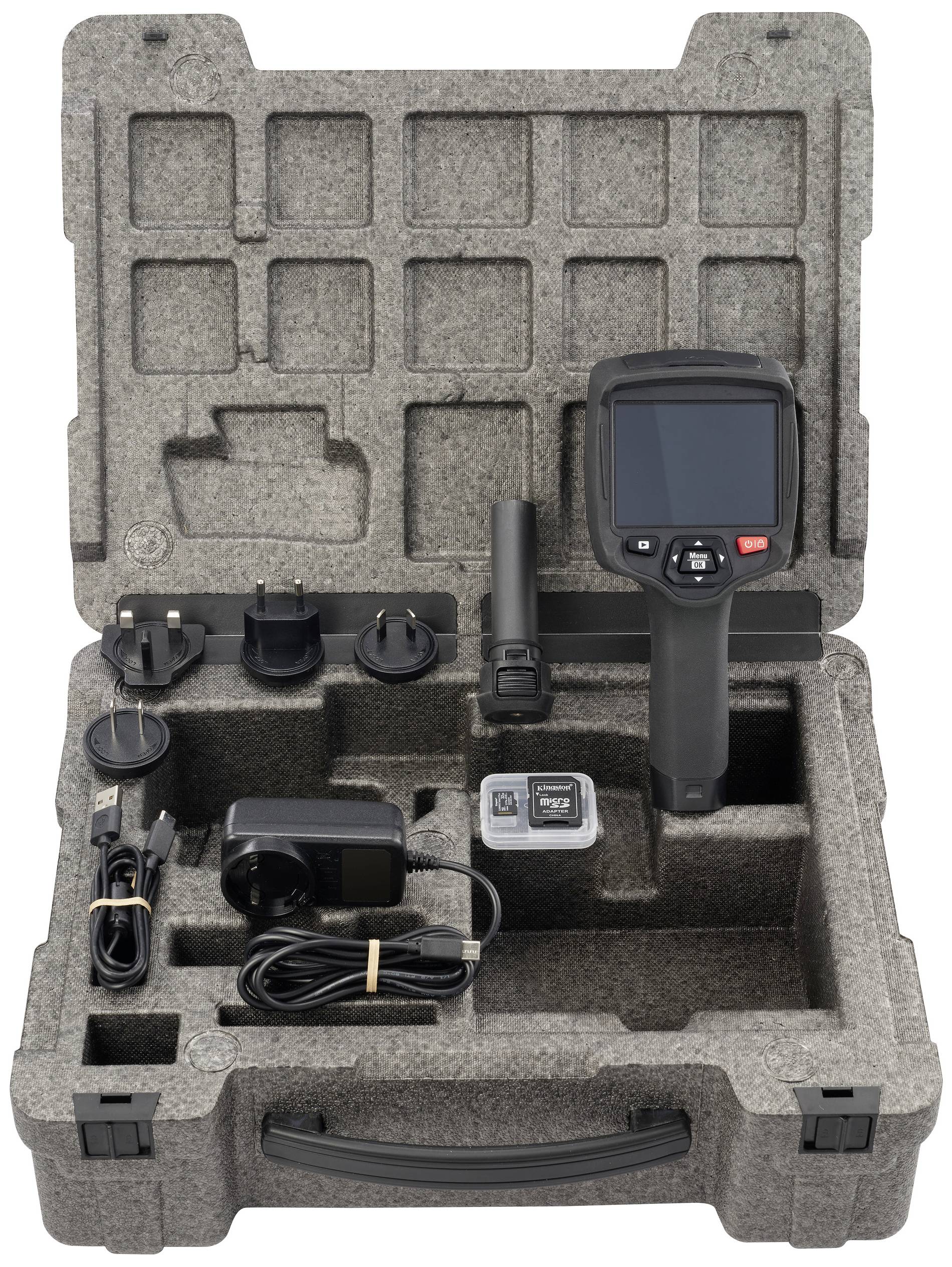 Draagbare thermoscanner in een koffer met oplader en internationale stekkers.