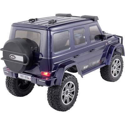 Speelgoedauto met grove banden in terreinauto-stijl, links achteraan afgebeeld. Donkerblauw model met reservewiel aan de achterkant.