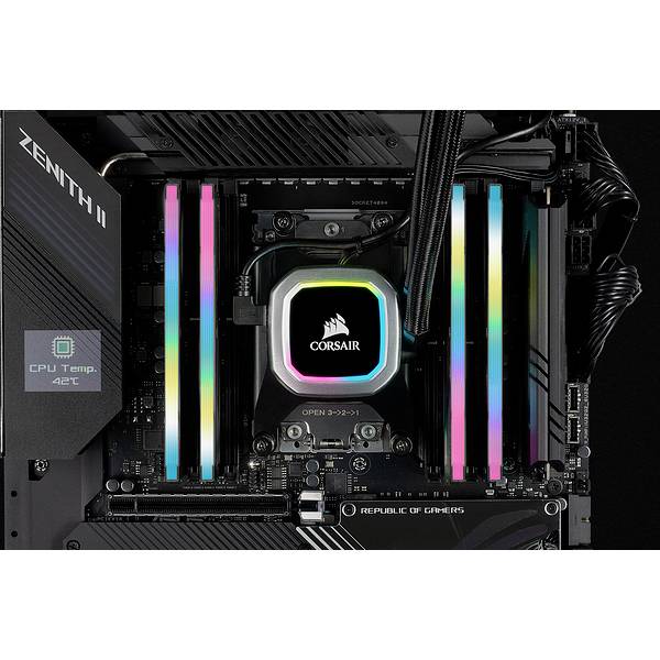 Een computer-moederbord met meerdere RAM-modules, een verlichte CPU-koeler van Corsair en een temperatuurweergave van 42°C.