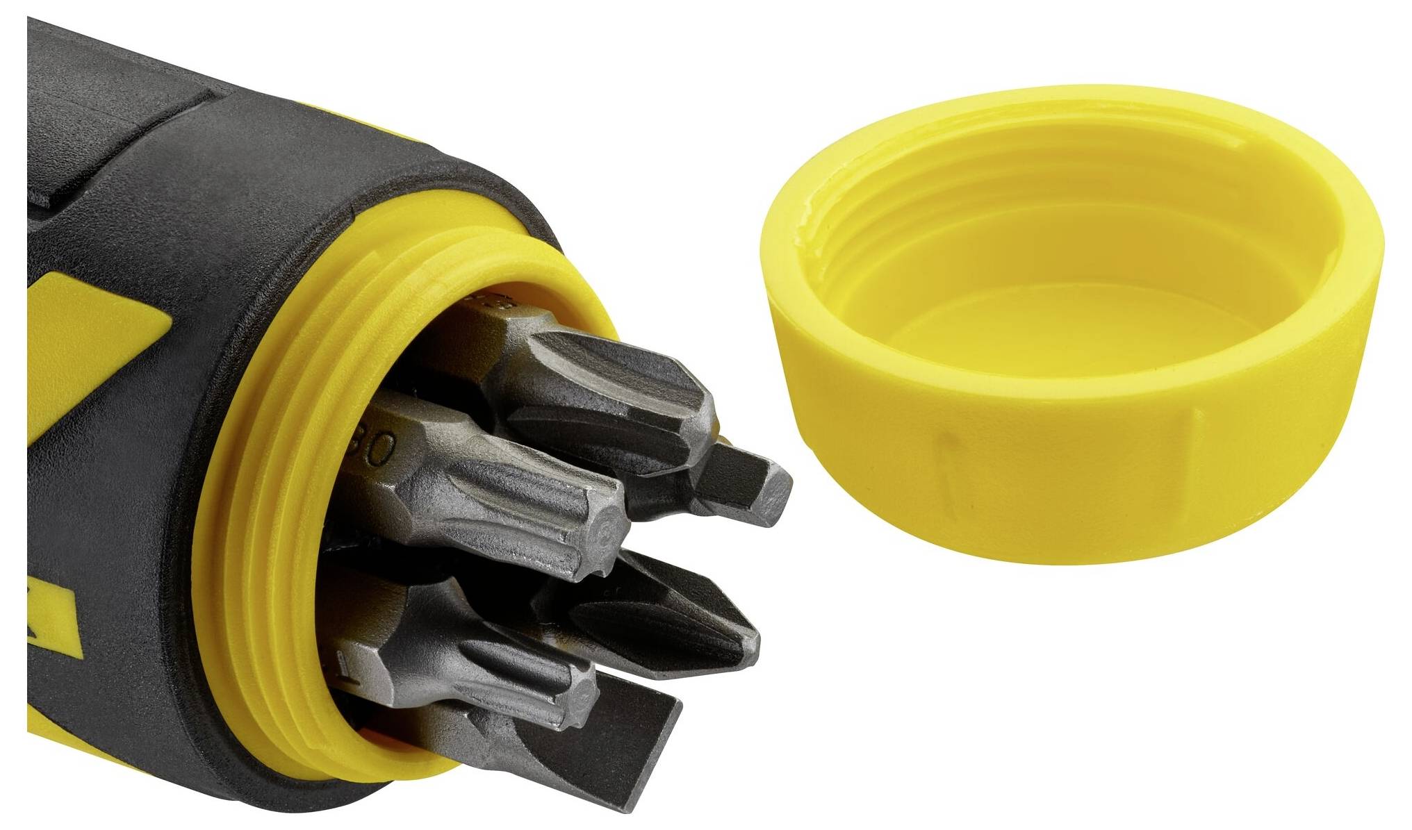 Een gele schroevendraaiergreep met verschillende metalen bits binnenin. Naast de greep ligt een gele schroefkap.