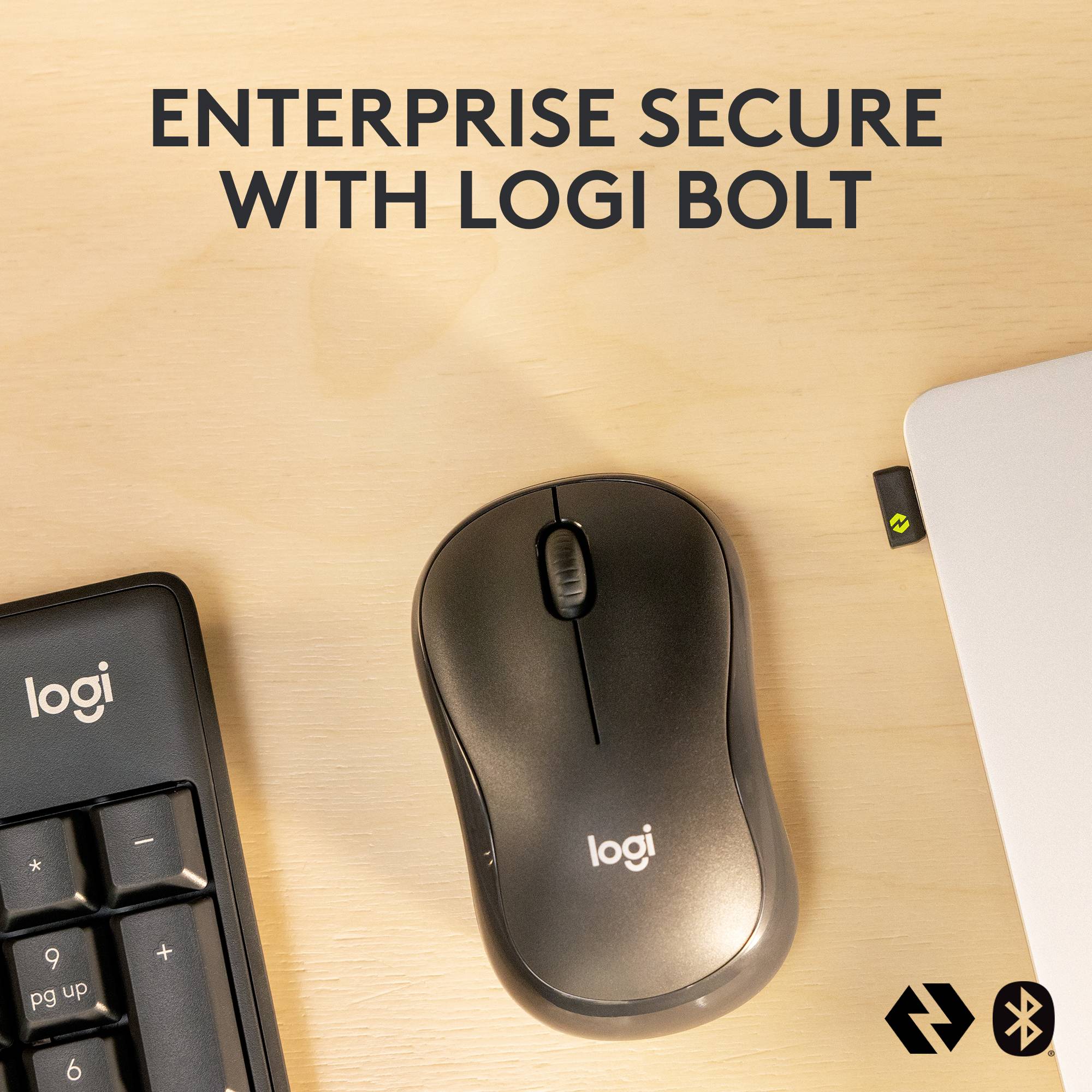 Toetsenbord, muis en laptop met de tekst 'Bedrijfsbeveiliging met Logi Bolt'.