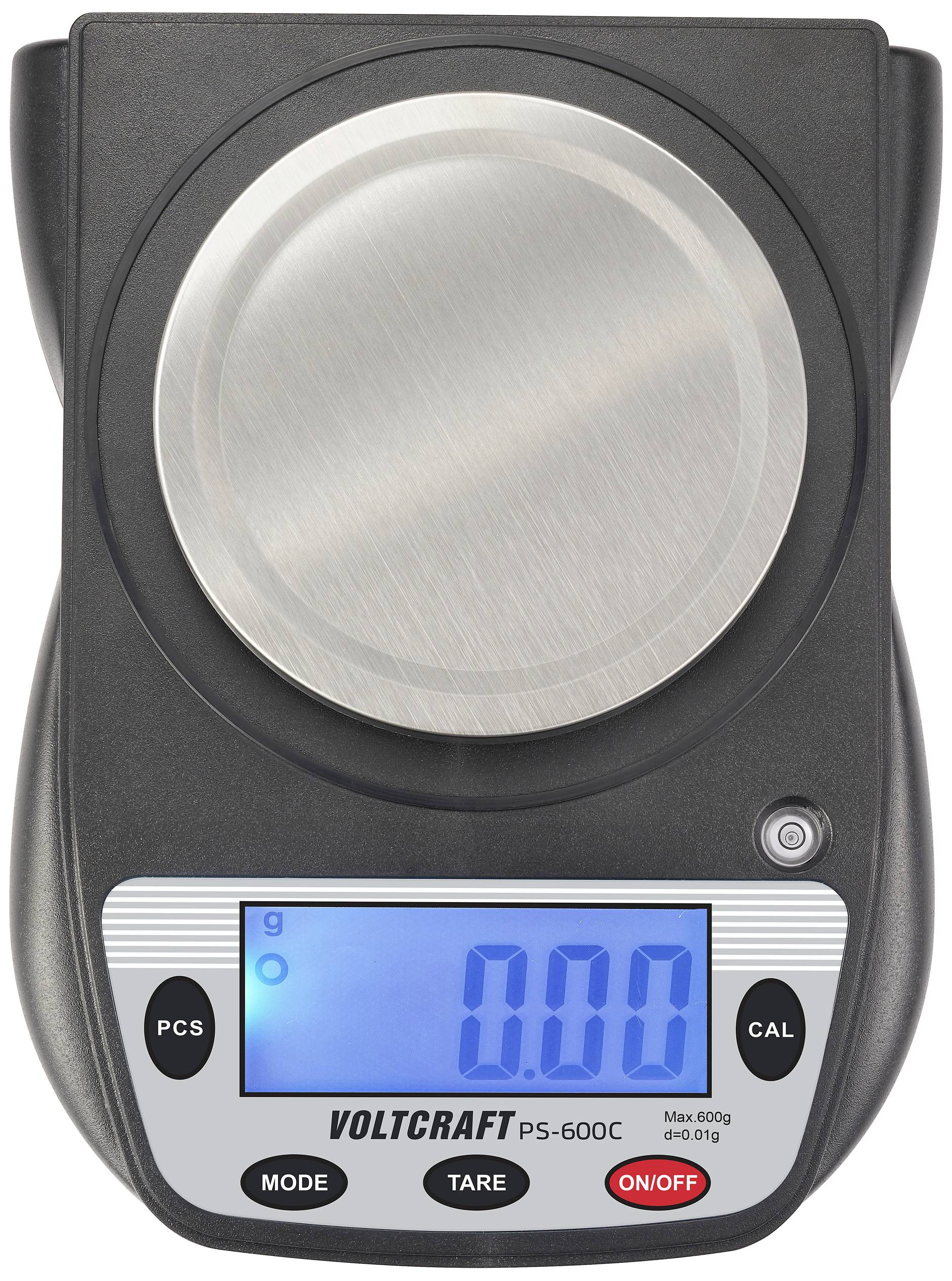 Elektronische weegschaal met digitale weergave toont '0,00 g'. Merk 'Voltcraft PS-600C'. Toetsen voor modi, tara en kalibratie zichtbaar.