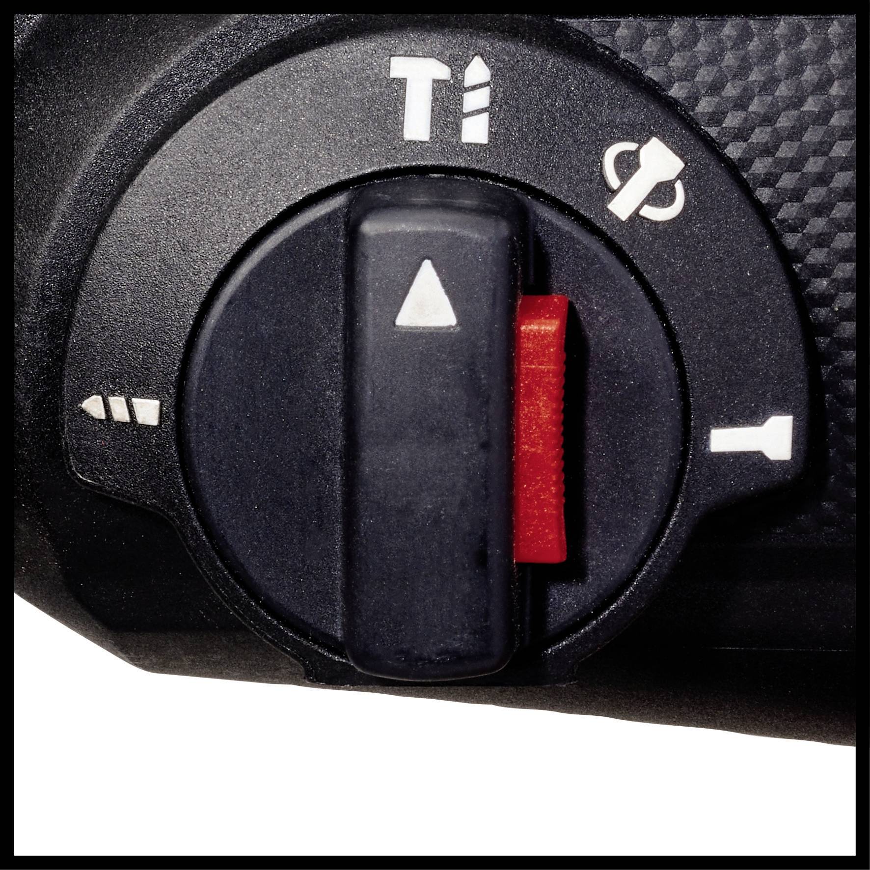 Een zwarte draaiknop met rode hendel op een camera voor het instellen van functies, omringd door symbolen voor verschillende modi.