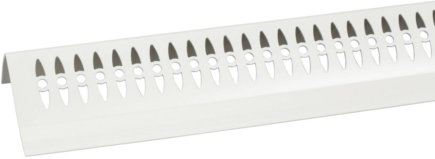 Witte plinten met ovale sleuven en cirkels voor ventilatie of decoratie.