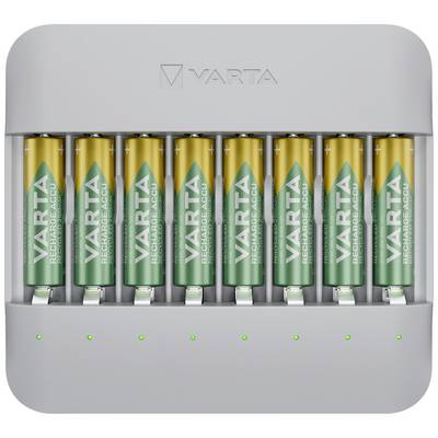 Acht batterijen, deels groen en deels geel, zijn geplaatst in een oplader van het merk Varta.