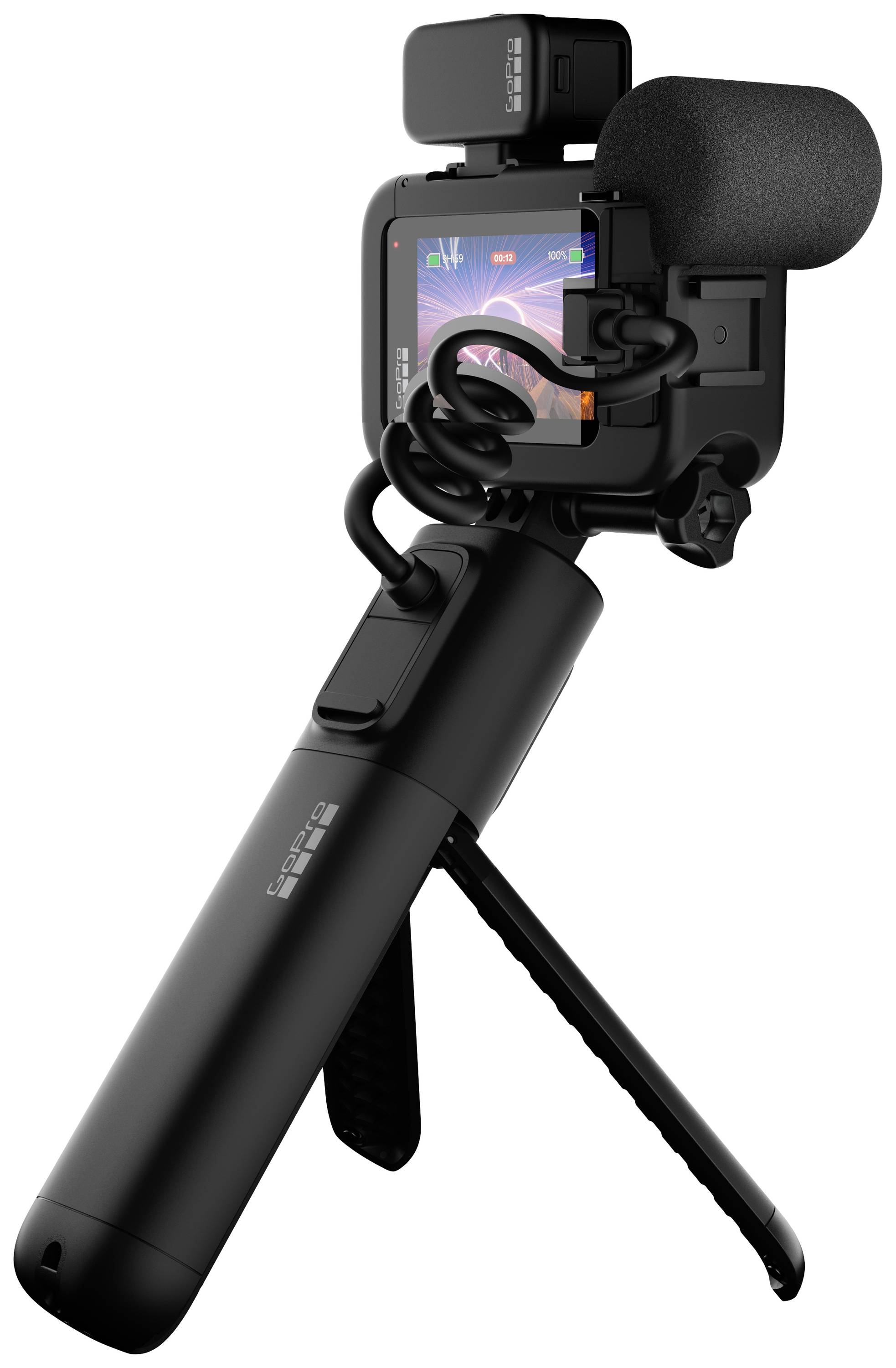 Compacte videocamera bevestigd op een statief met een microfoon, display toont een opname met heldere kleuren. Geschikt voor vlogging.