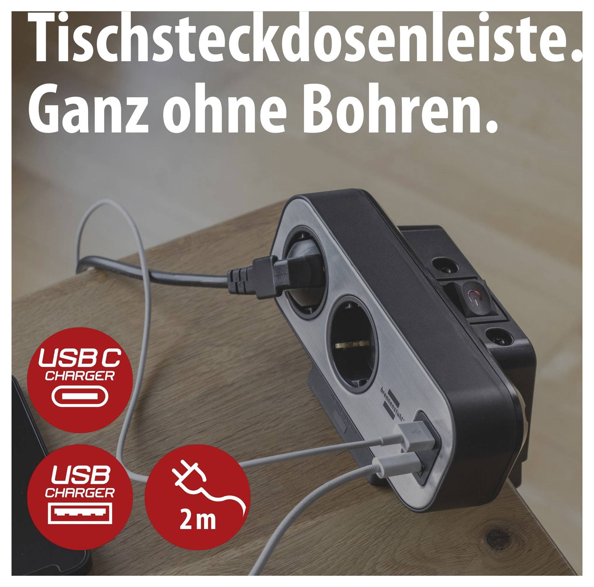 Advertentieafbeelding van een tafelstekkerstrip met twee USB-aansluitingen, 'Volledig zonder boren', op een houten tafel met aangesloten kabels; pictogrammen tonen USB-C, USB en 2 m.