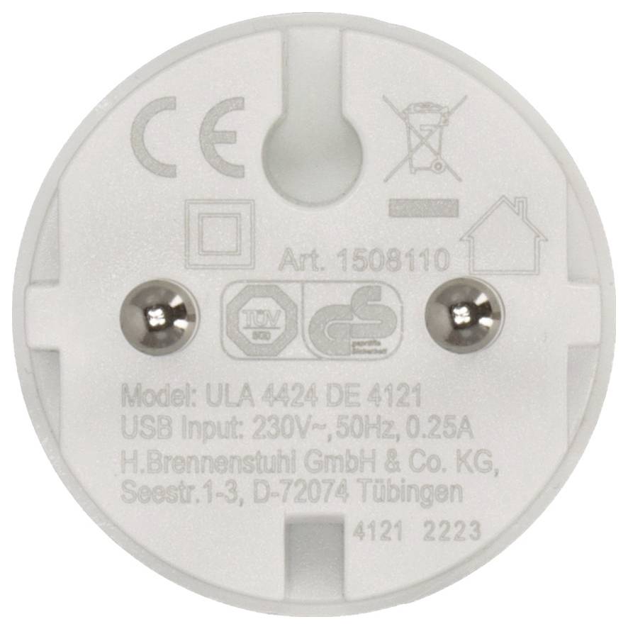 Vergroting van een ronde witte elektrische stekkeradapter met twee metalen pennen, CE- en veiligheidssymbolen, en afgedrukte model- en ingangsspanningstekst.