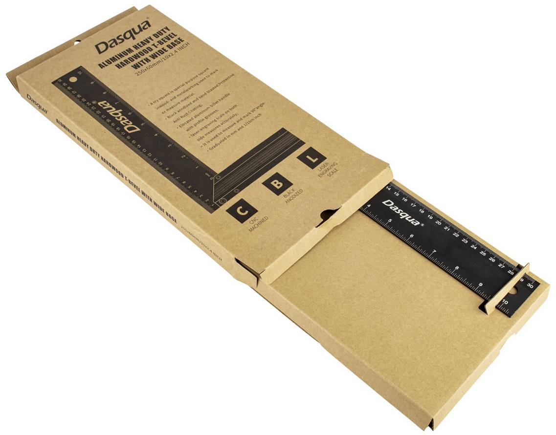 Een verpakt zwart aluminium lineaal (300 mm) van Dasqua ligt half open in een bruine kartonnen doos.